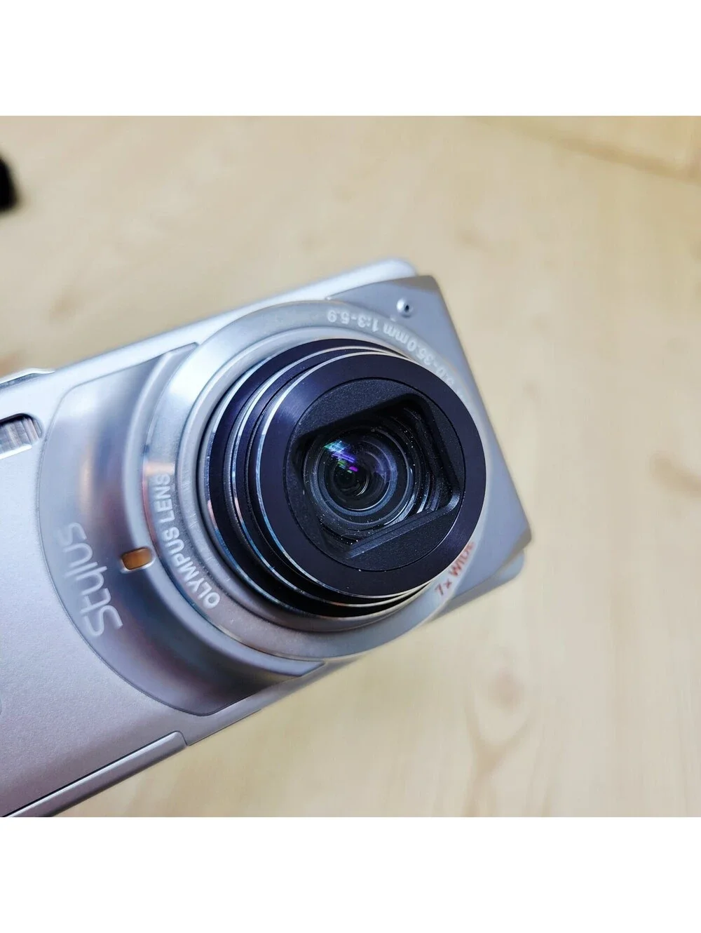Olympus Stylus 7010 12.0MP Silver Digital Camera with Charger NO SD CARD WORKS!